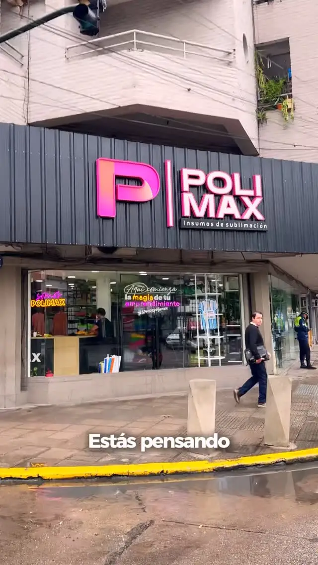 Fachada del local de Polimax en esquina, con cartel luminoso: Polimax — Insumos de sublimación